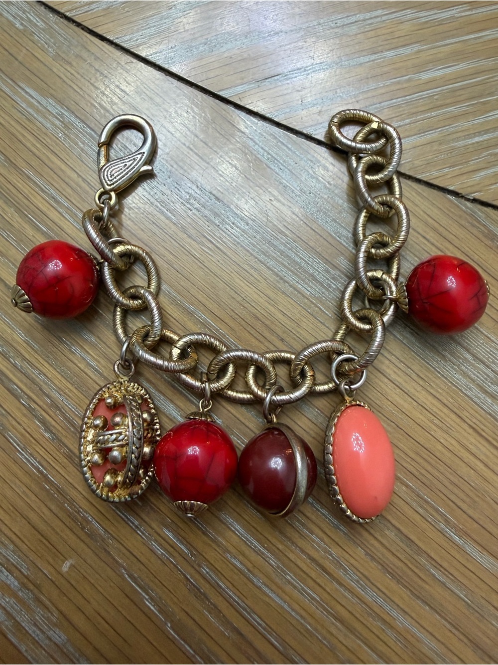 Gold Chain Charm Bracelet with Red and Coral Beads